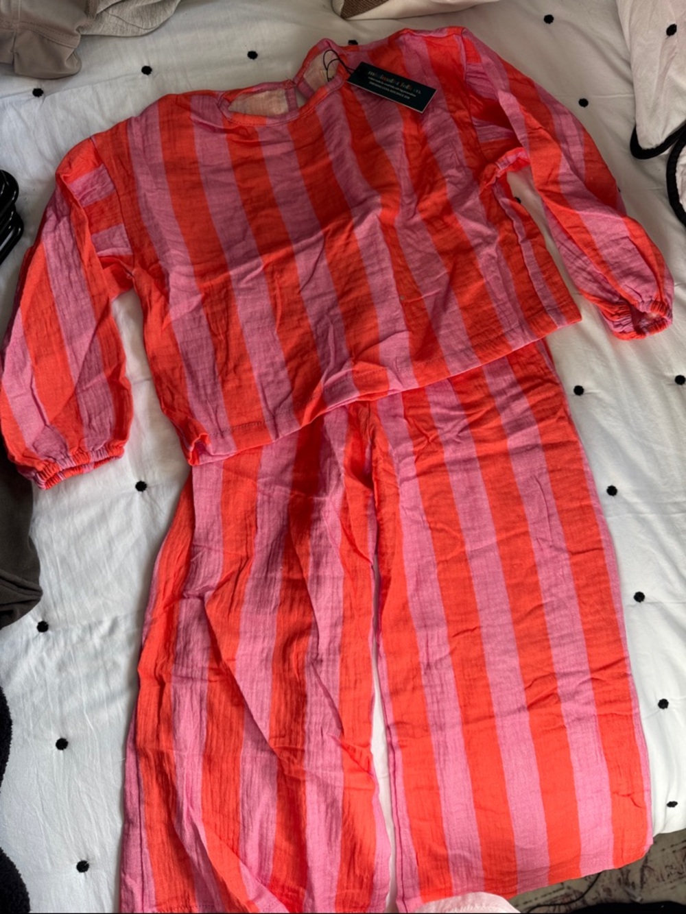 Those stripes though Striped Two-Piece Top & Wide Leg Pants in Coral and Pink